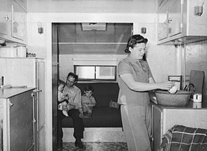 Family at home at FSA defense workers camp